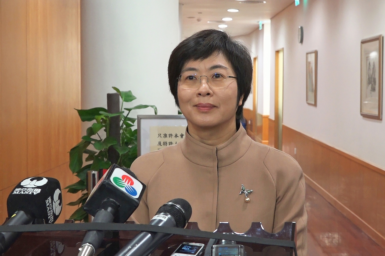 The Secretary for Administration and Justice, Ms Chan Hoi Fan, speaks to reporters.