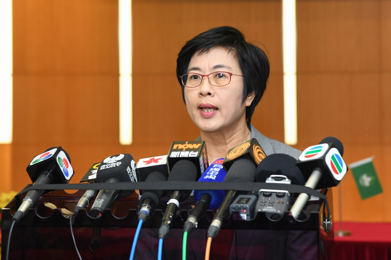 The Secretary for Administration and Justice, Ms Chan Hoi Fan, speaks to reporters.