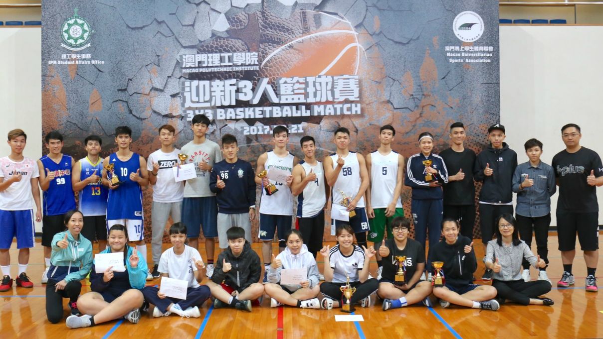 Winning teams and players posing for a group photo