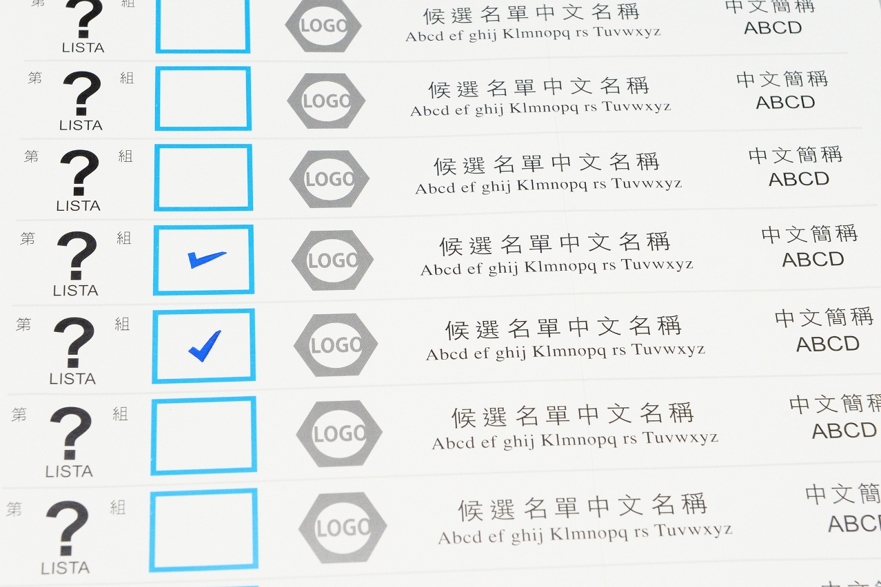 A ballot is invalid if stamped in more than one election team box.