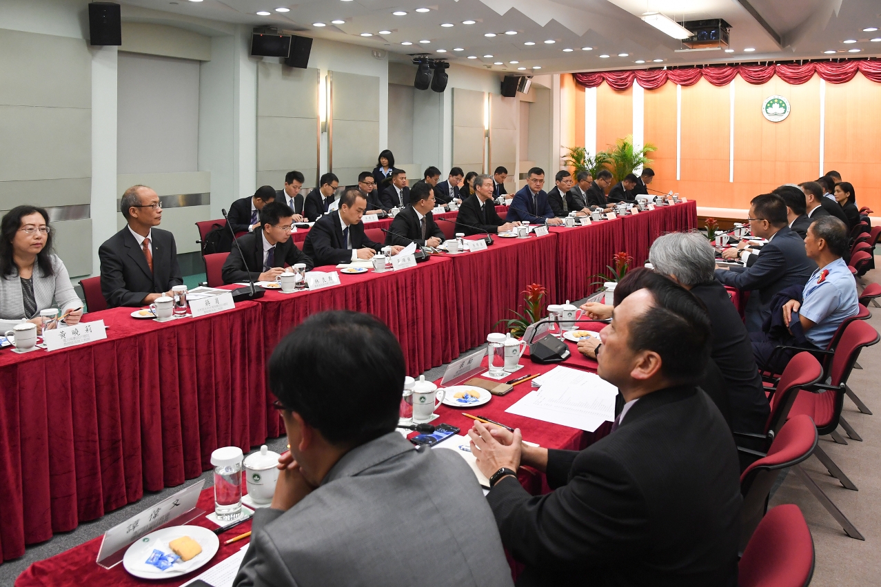 Experts from the National Commission for Disaster Reduction receive a briefing at the Government Headquarters regarding response measures for Typhoon Hato.