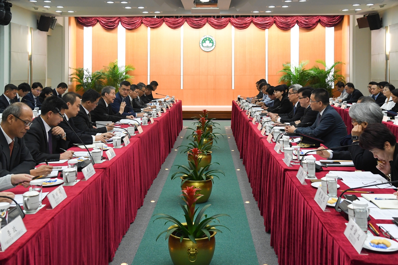 Experts from the National Commission for Disaster Reduction receive a briefing at the Government Headquarters regarding response measures for Typhoon Hato.