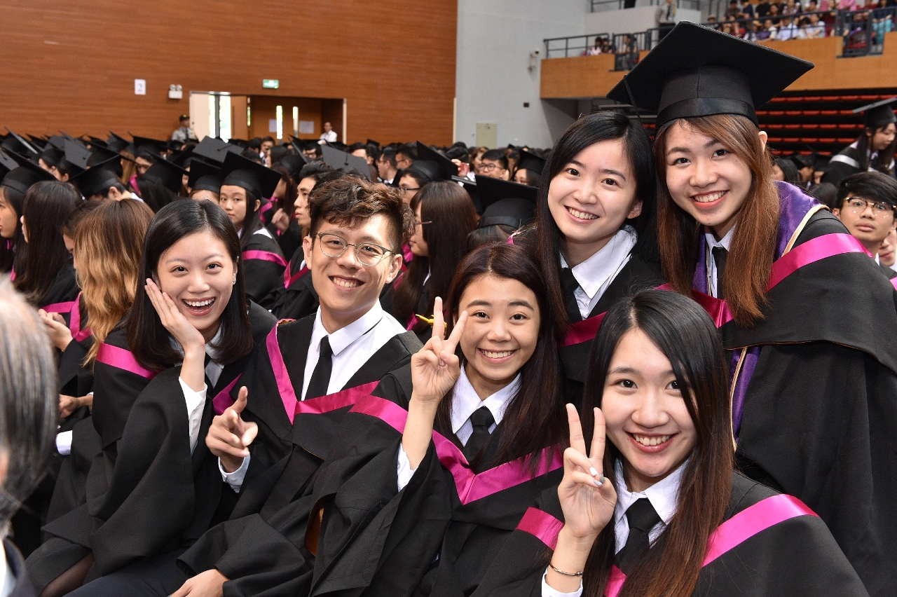 Graduates take photos of the beautiful moment