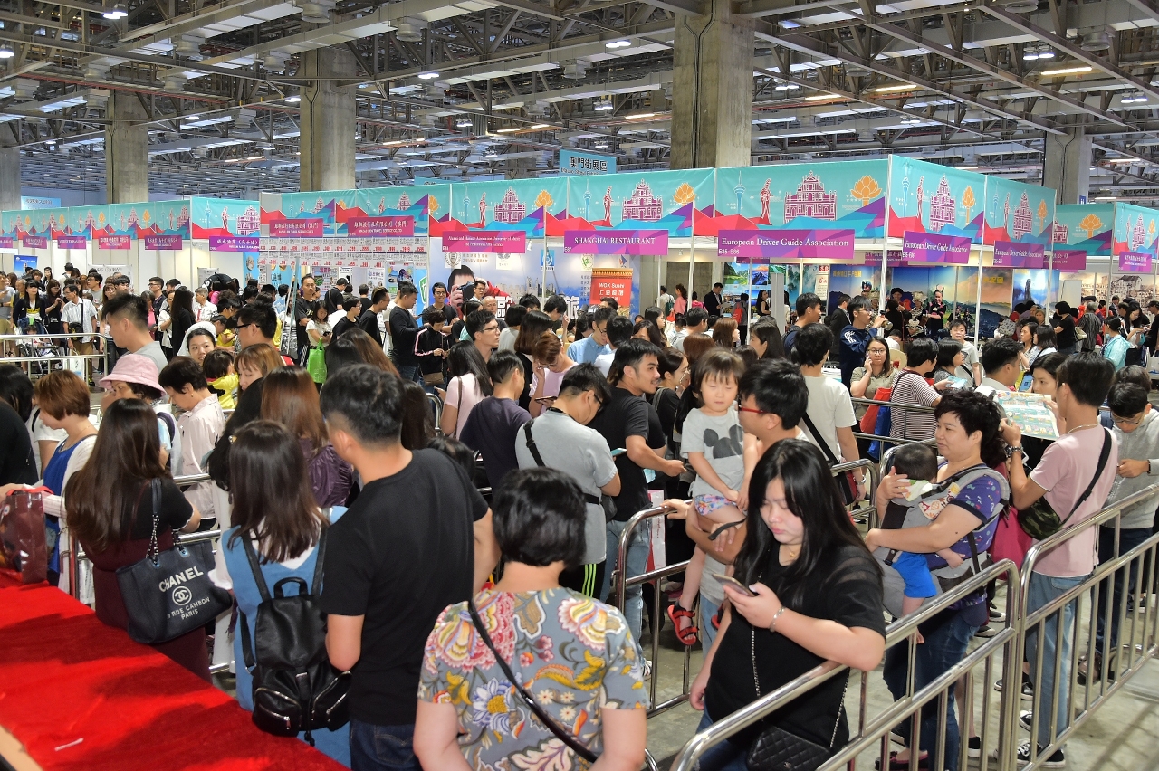 The exhibition floor bustles with visitors
