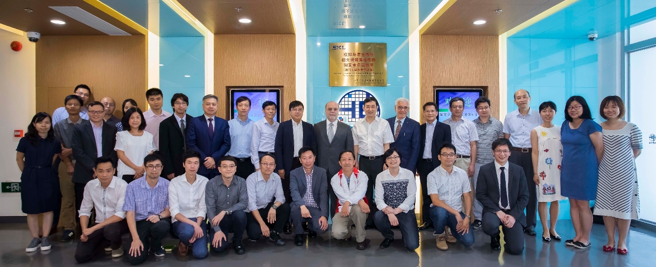 Wang Xi inspects the QRCM Lab