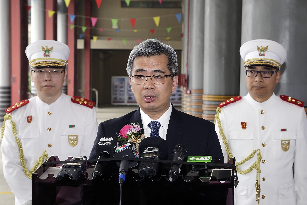 The Secretary for Security, Mr Wong Sio Chak, speaks to reporters.
