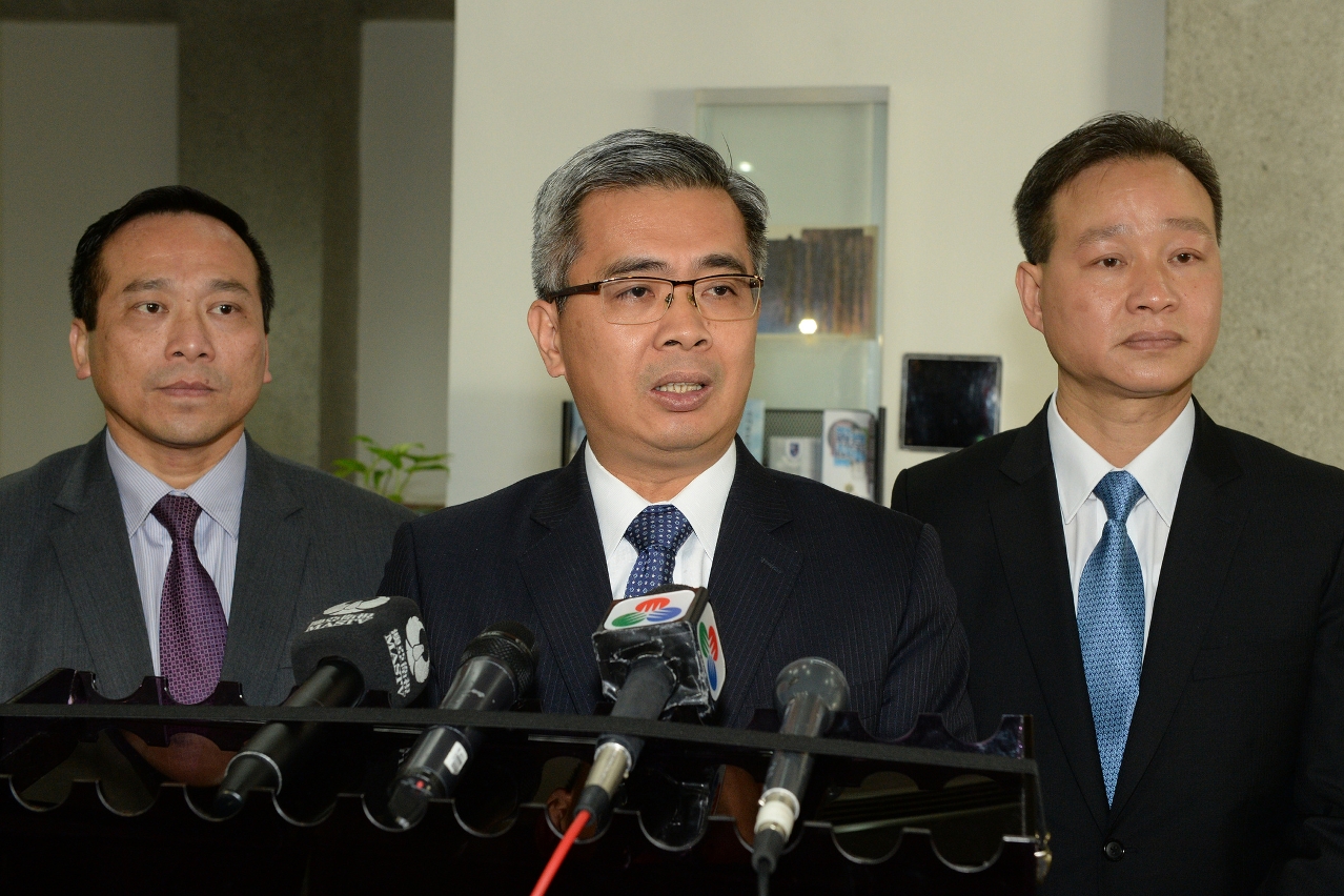 The Secretary for Security, Mr Wong Sio Chak, speaks to reporters.