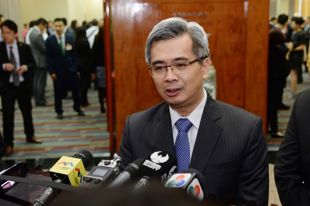 The Secretary for Security, Mr Wong Sio Chak, speaks to reporters.