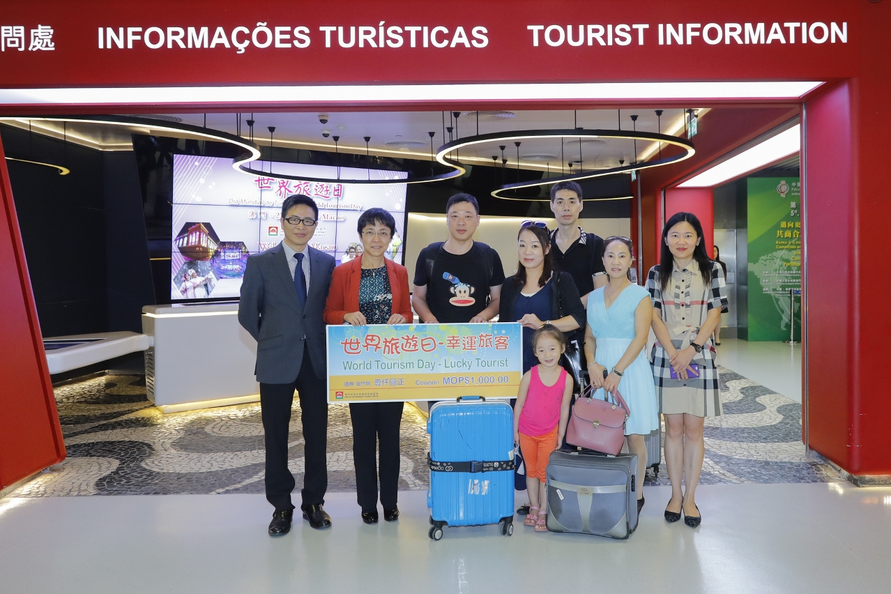 MGTO officials and the Lucky Tourist