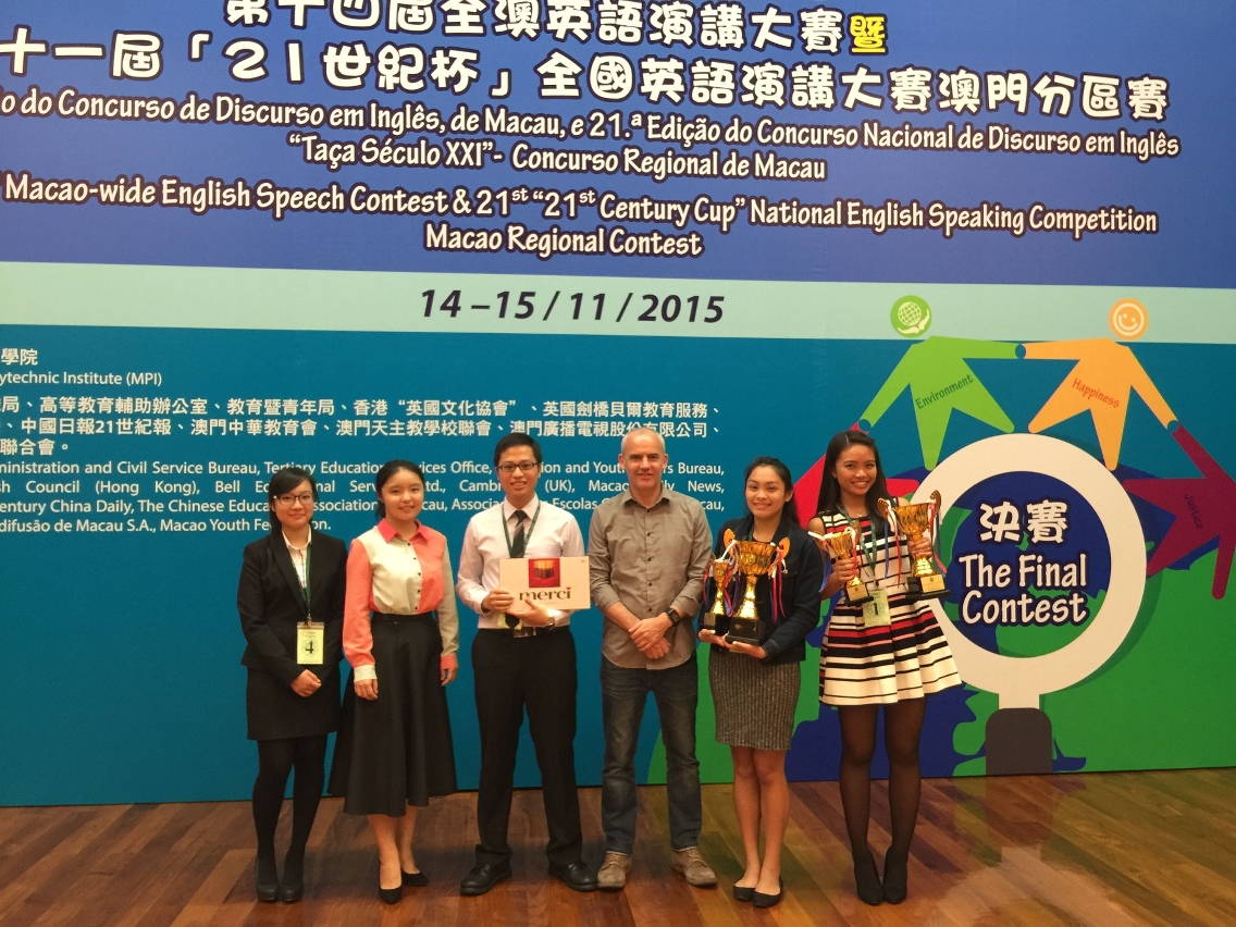 UM students Romina Eloisa Abuan (2nd from right) and Bianca Margarita (1st from right) win first and second prizes respectively in the college category