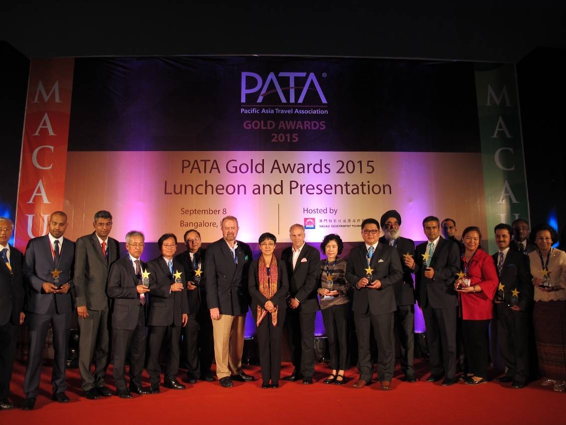 Senna Fernandes and PATA leaders with PATA Gold Awards winners