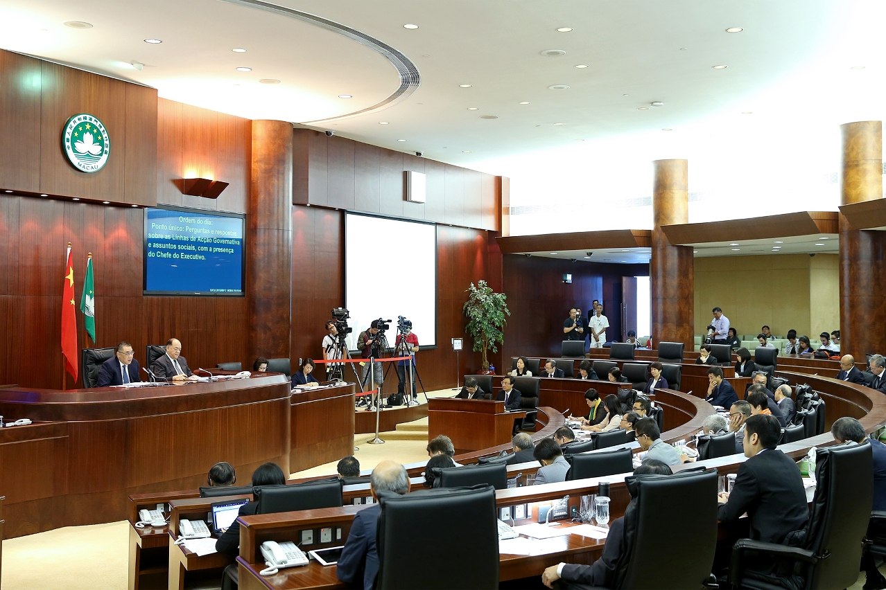 Chief Executive, Mr Chui Sai On, takes questions from legislators at a plenary session of the Legislative Assembly.