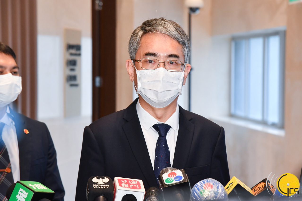 The Secretary for Administration and Justice, Mr Cheong Weng Chon, speaks to reporters.