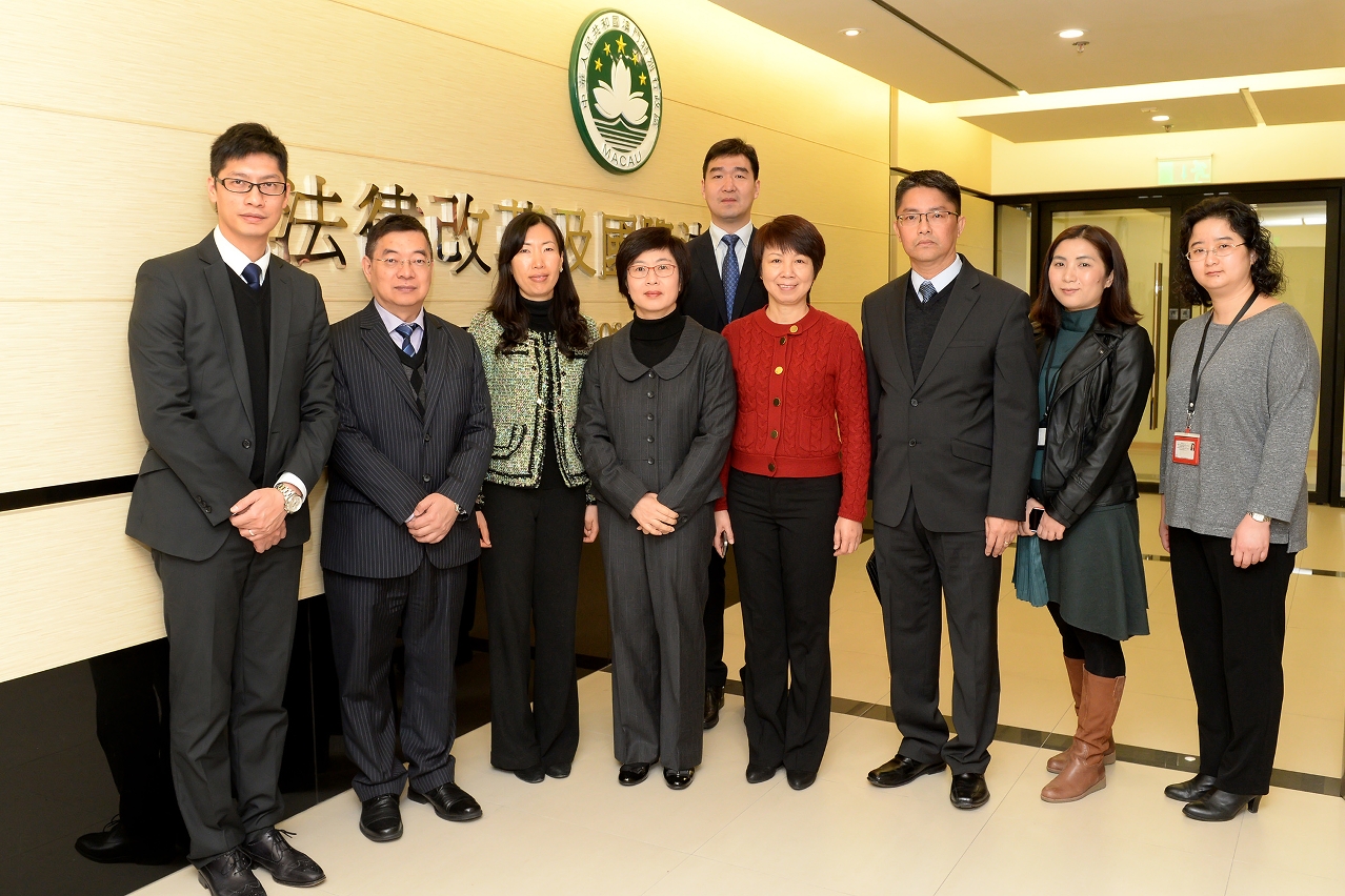 Secretary for Administration and Justice, Ms Chan Hoi Fan, poses for a group photo with officials of the Law Reform and International Law Bureau.