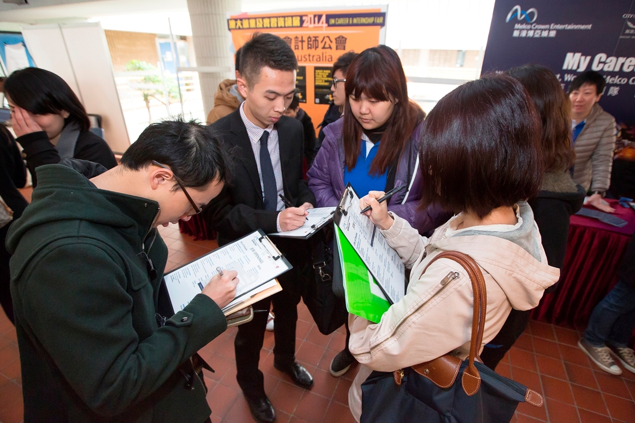 Students fill out job application forms