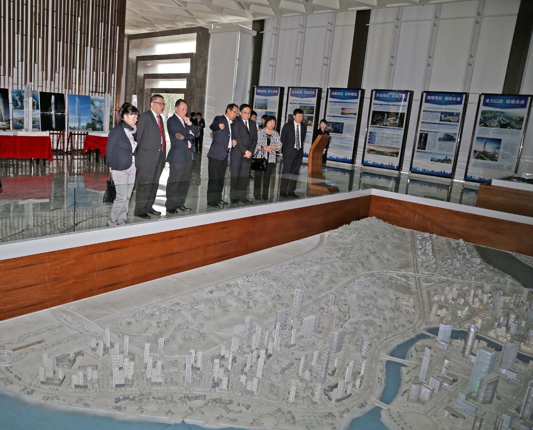 Group photo of delegation visit the Shizimen Central Business District and briefed by the General Manager of the District, Mr. Tang Zengshu.