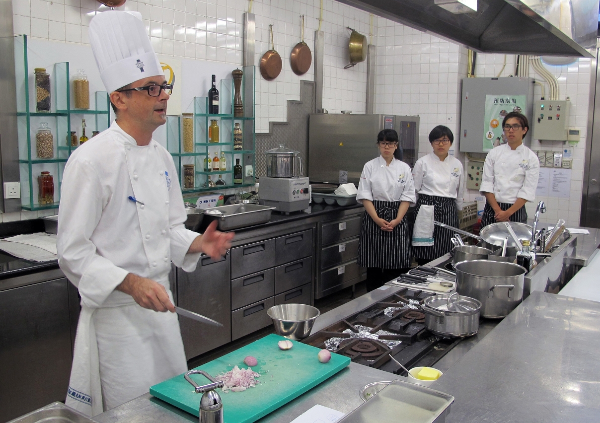 Chef Philippe Clergue demonstrating cooking skill