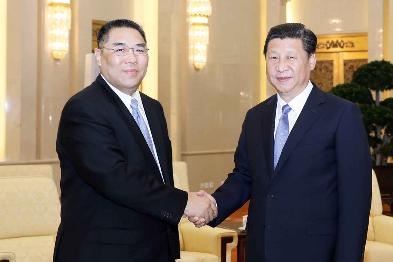 President Xi Jinping receives Chief Executive of the Macao SAR, Chui Sai On (left) in Beijing.