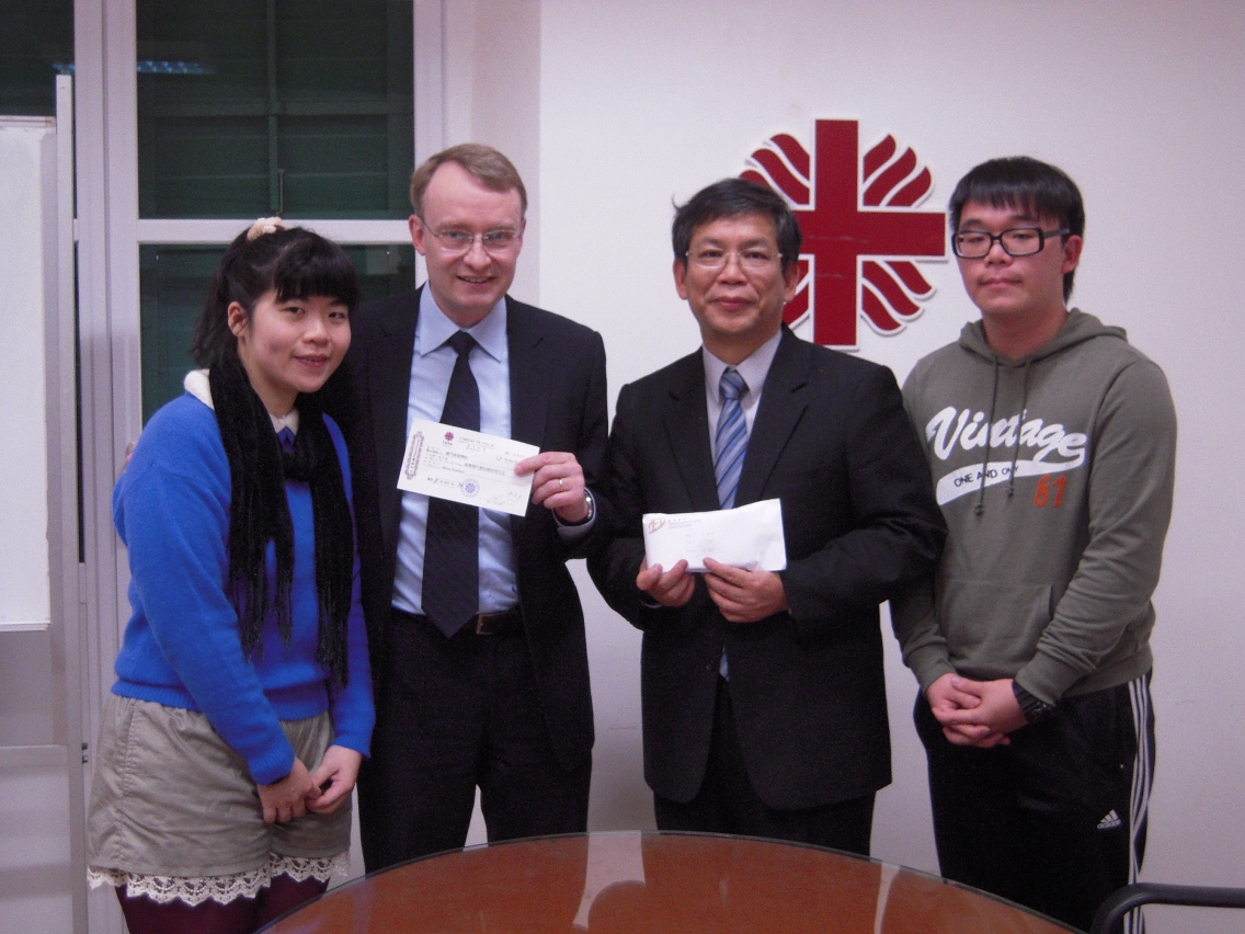 The picture shows from left to right, Ms. Brigida Wong, Programme Organiser – Caritas, Dr. Baudouin Neirynck, Assistant Professor – IFT, Mr. Paul Pun Chi Ming, Secretary General of Caritas and Mr. Reginald Wong Yiu Pun, Deputy General Manager – 2011 Macau Slow Food Awards.