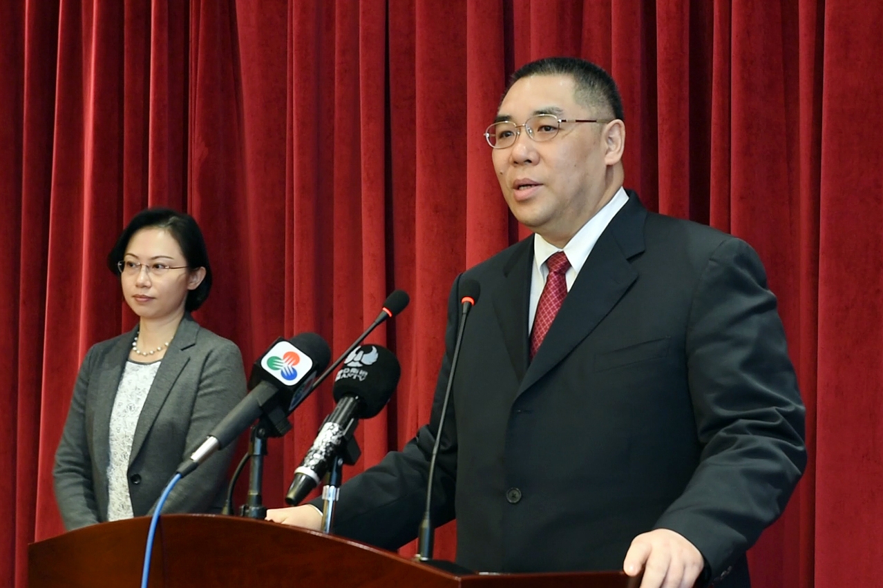 Chief Executive, Mr Chui Sai On, speaks to reporters before departing for Beijing.