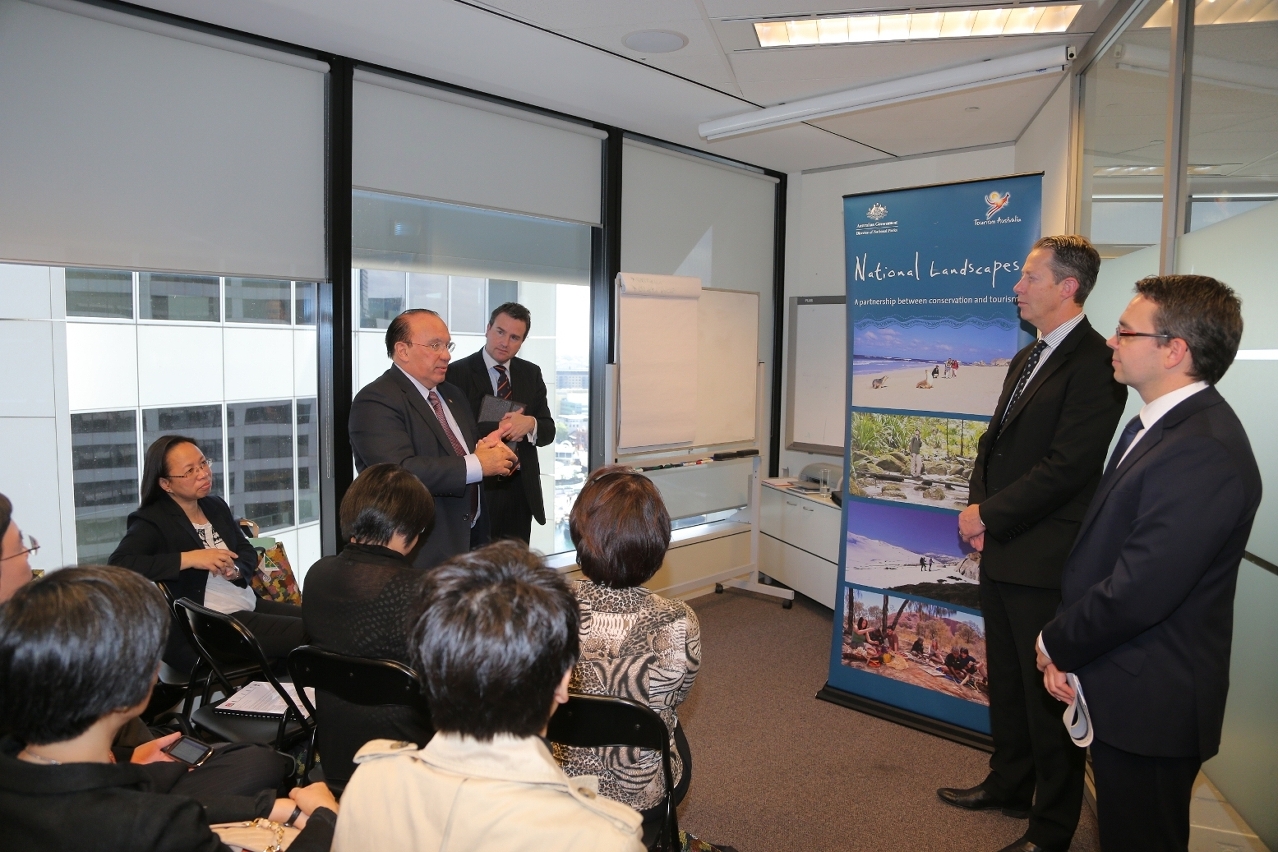 Director Antunes exchanges with Andrew McEvoy