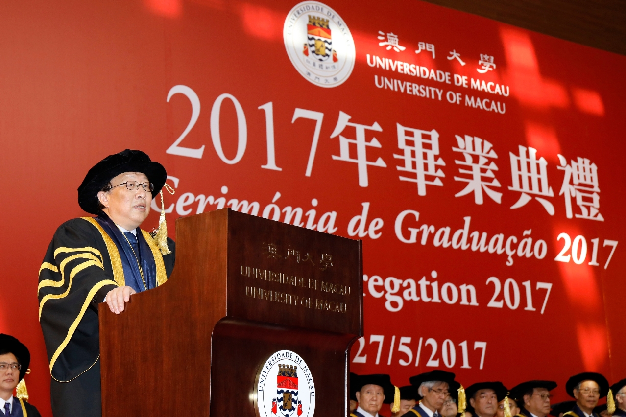 Wei Zhao congratulates the graduates