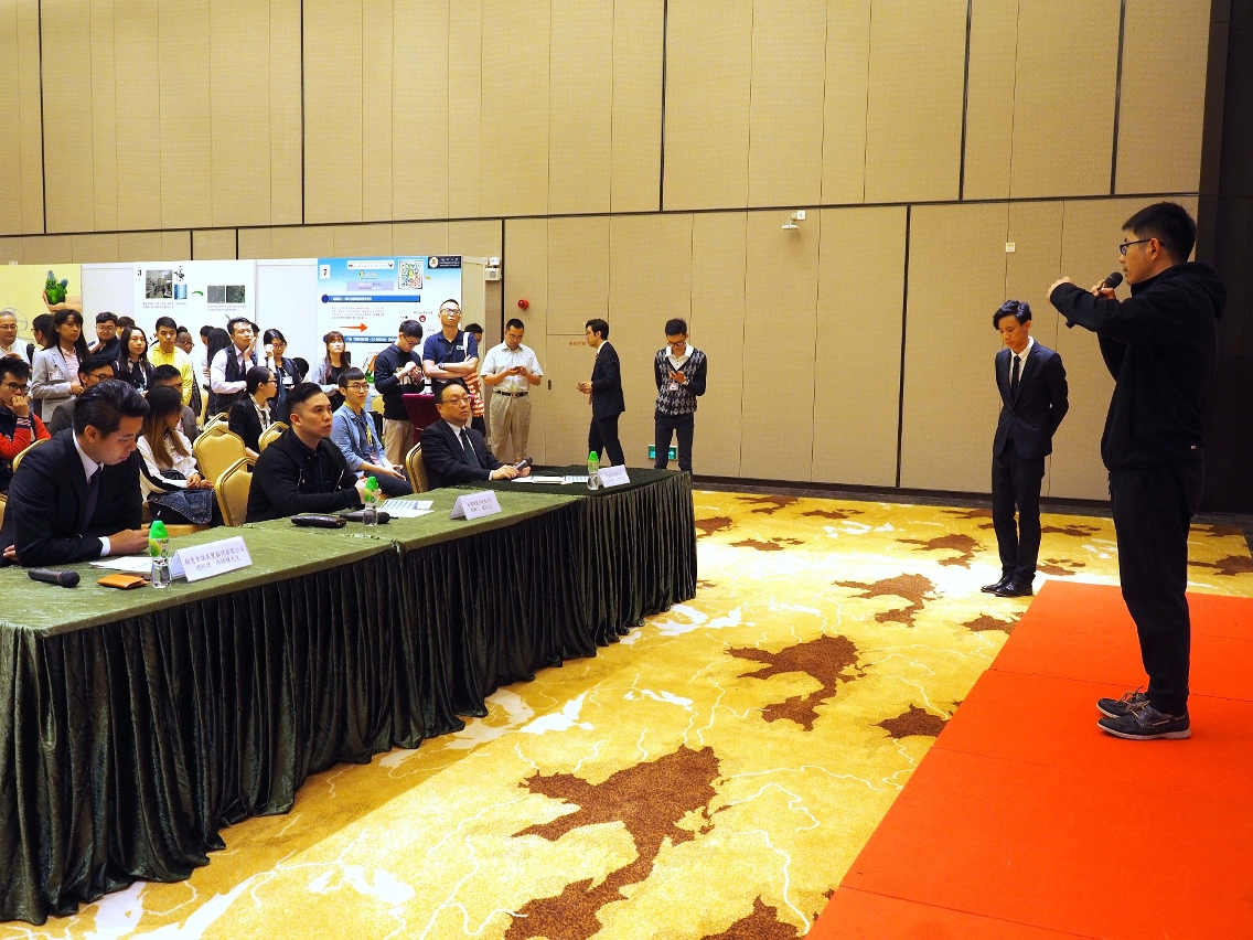 A participant in the competition presents his business idea