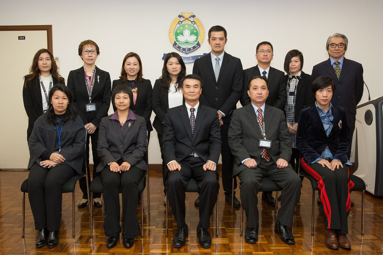 The leadership and heads of Correctional Services Bureau and the two new Division Heads in a group photo