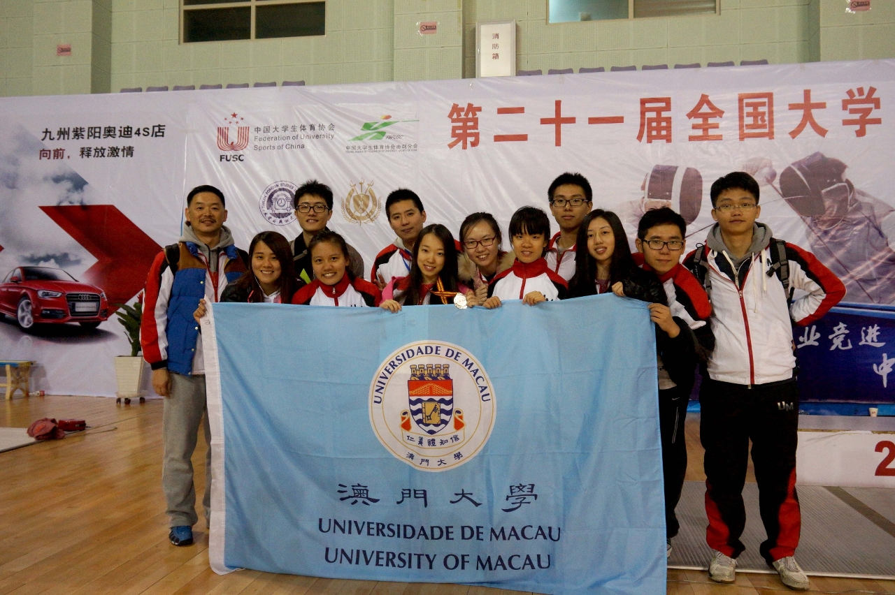 A group photo of the UM Fencing Team