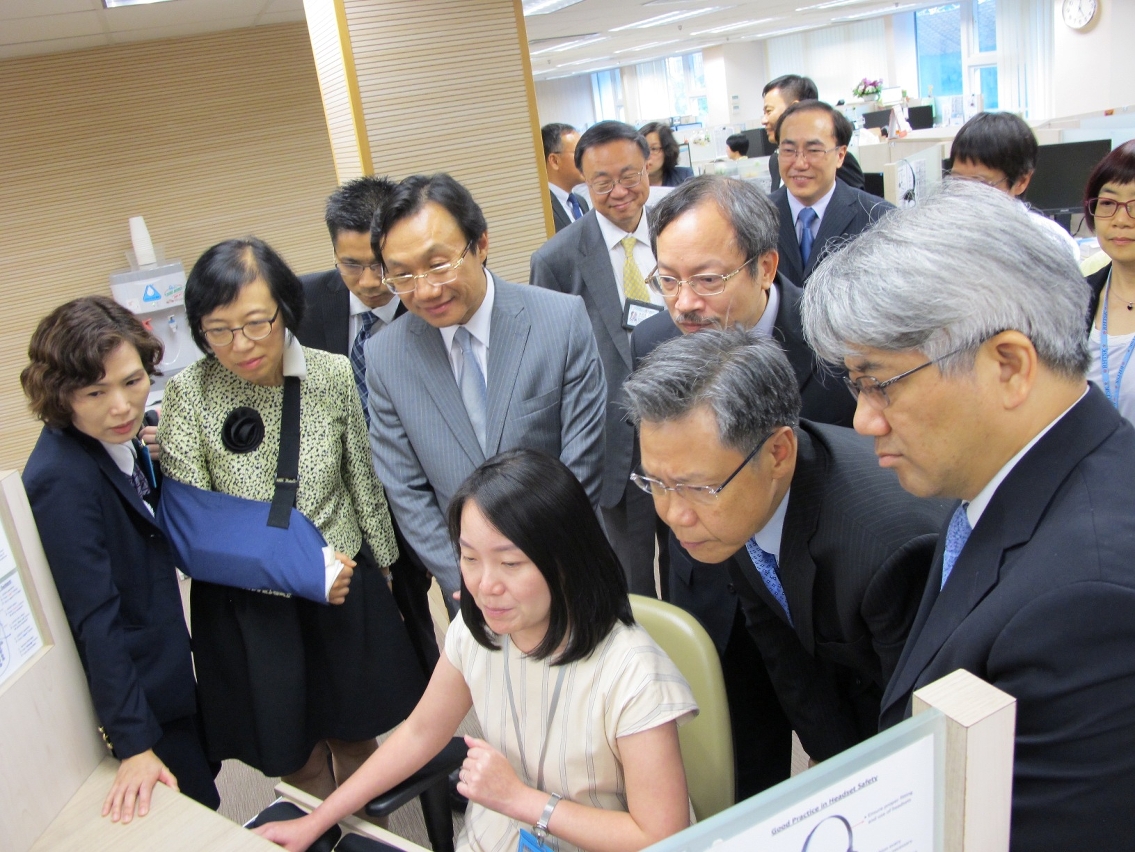 Members of the delegation are briefed on the hospital’s operation of telephone service.