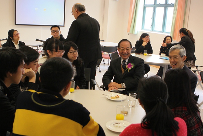 Teachers and students chat in one of the smart classrooms