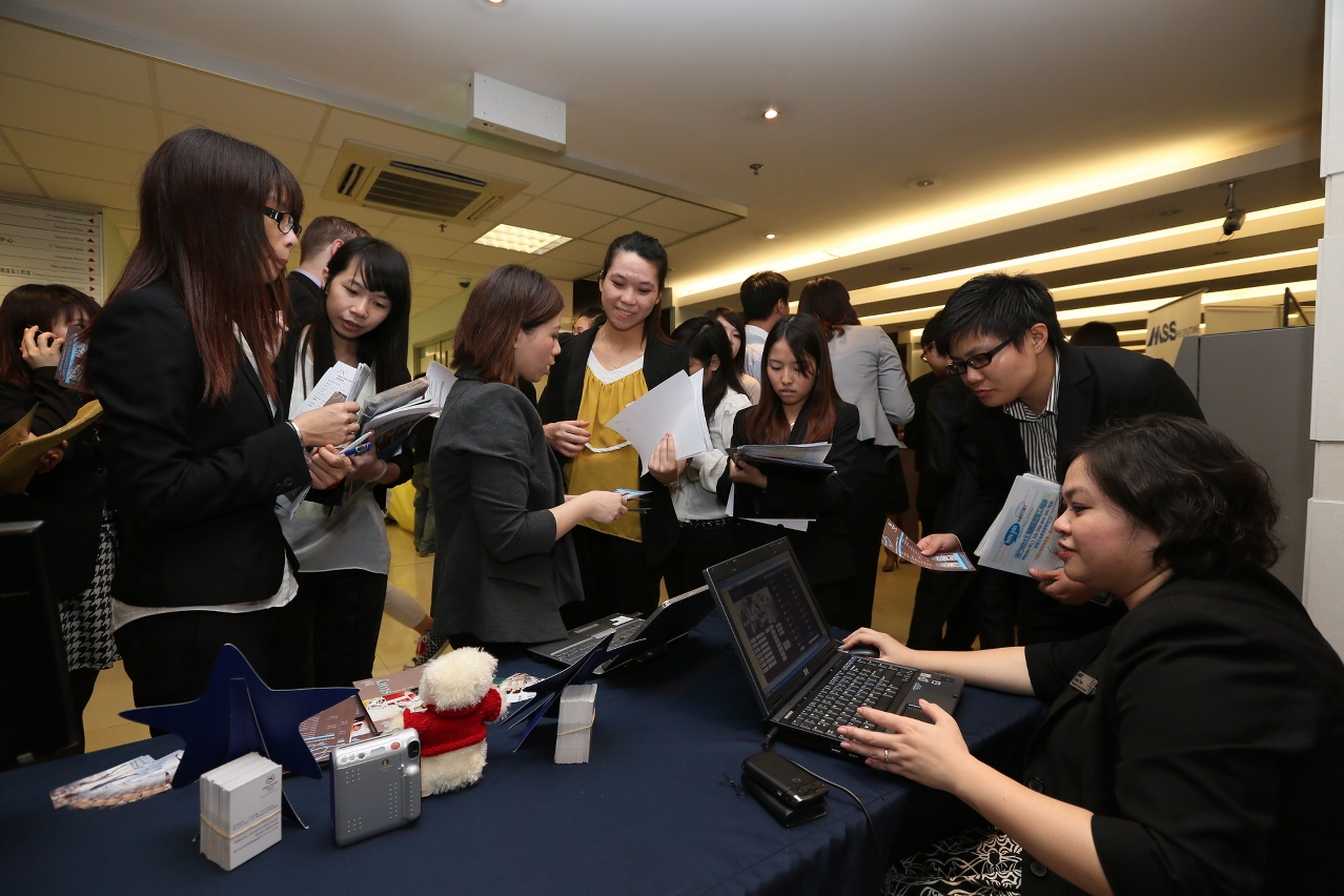 Students enthusiastically enquiring about career opportunities
