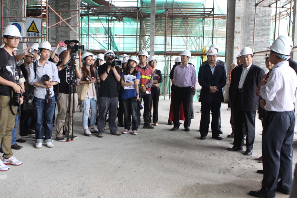 Media representatives visit the library
