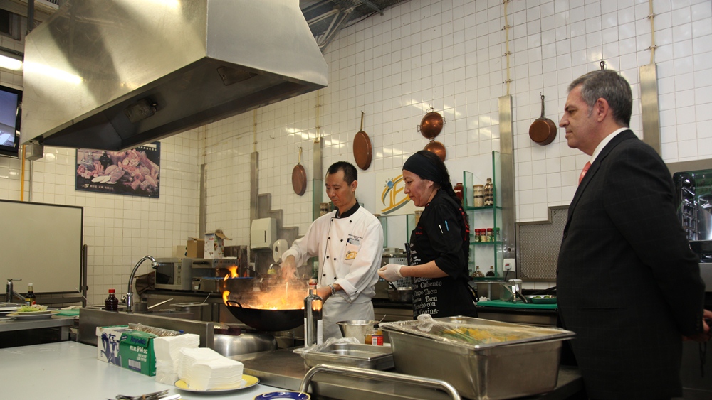 Chef Maria Rosa Vasquez Chavez, from Peru (middle) demonstrating famous Peruvian cuisine