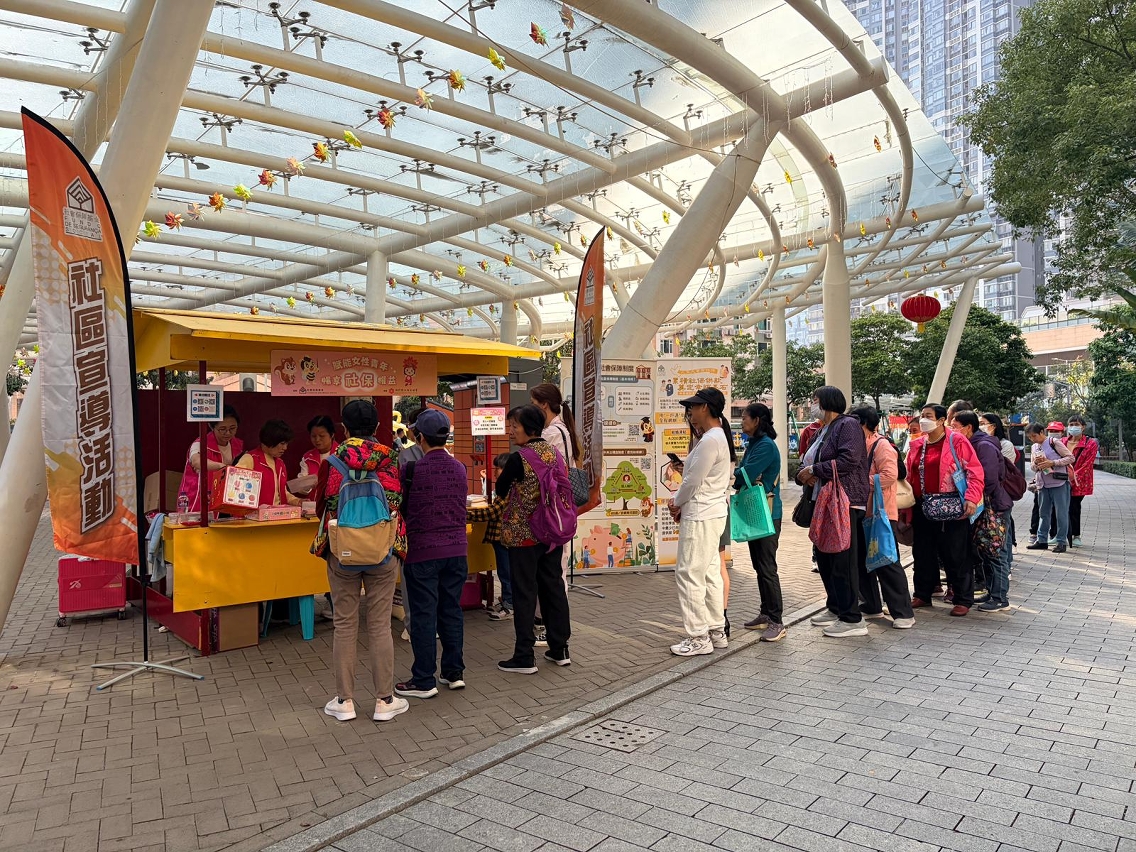 Photo 1:  Street booth activity jointly organised by the Social Security Fund and a community  association to promote awareness of the two-tier social security system